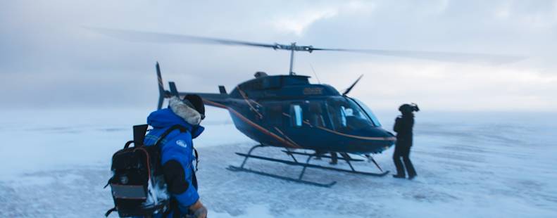 Researchers looking at a helicopter