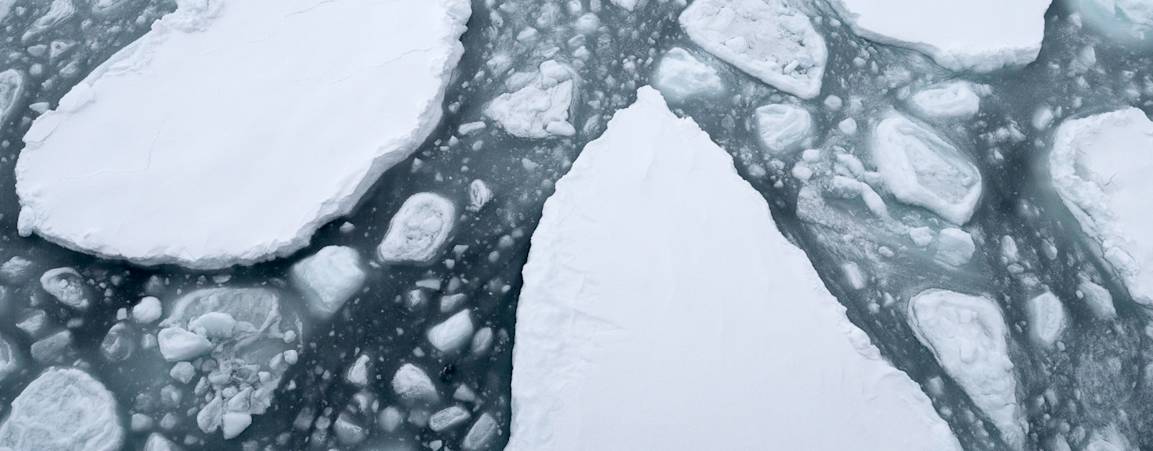 Arctic sea ice chunks floating in the water