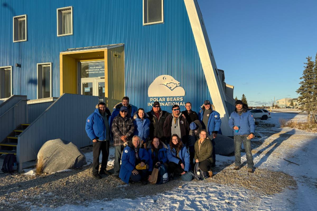 Participants in the community exchange group gather in front Polar Bears International House in Churchill. 
