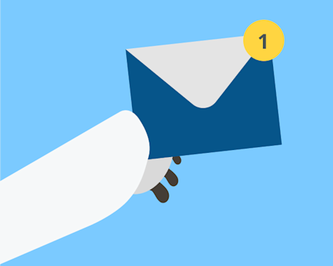 Polar bear paw holding an envelope