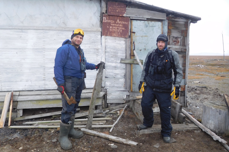 Dr. Eric Regehr, left, and Geoff York bear-proof one of Wrangel Island's field cabins