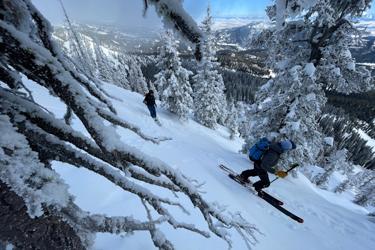 BJ Kirschhoffer and Kt Miller backcountry skiing
