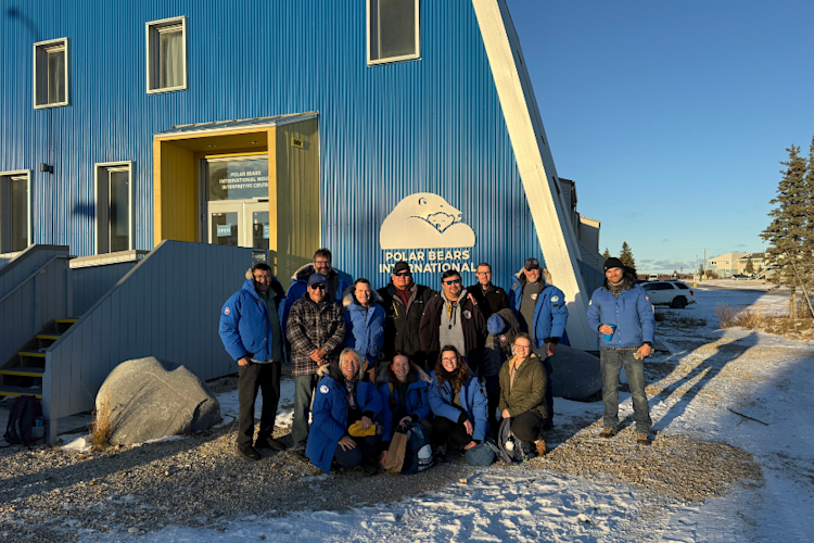 Participants in the community exchange group gather in front Polar Bears International House in Churchill.