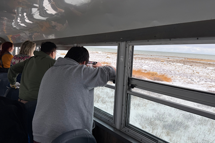 Community Exchange Participants Taking Photos from the Tundra Buggy